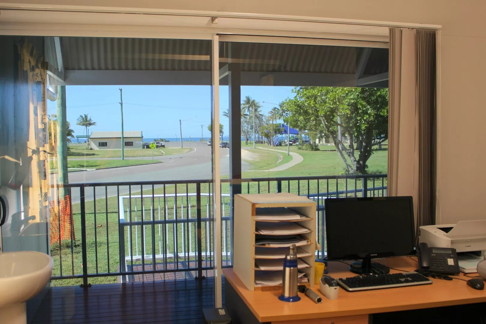 The reception desk at Hinchinbrook Health Care, looking out to the street