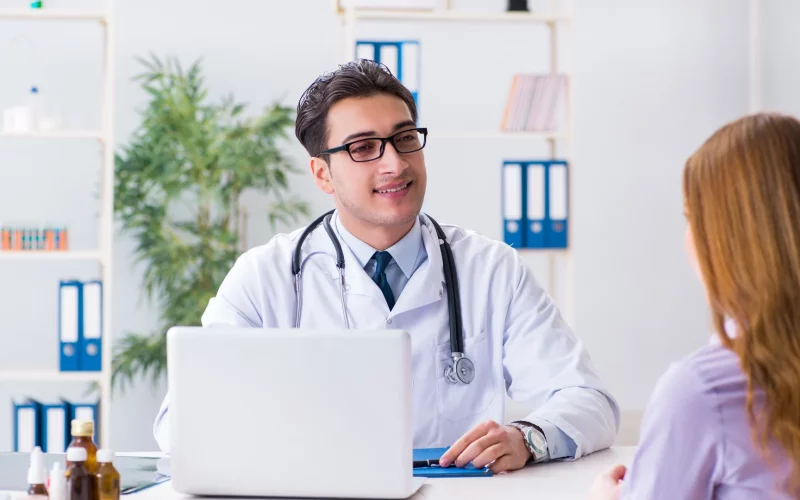 A doctor in consultation with a patient